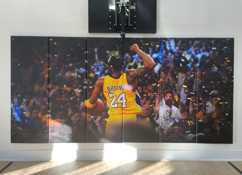 Custom print basketball wall padding installed under a wall-mount hoop, printed edge-to-edge across six pads