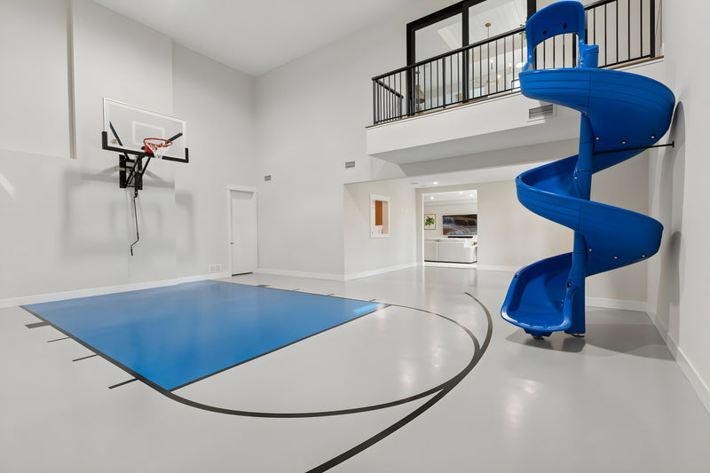 Gladiator wall-mounted basketball hoop installed in an indoor court